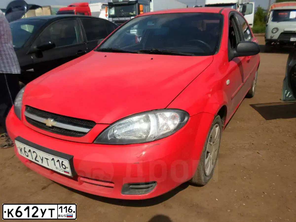 Фото автомобиля CHEVROLET LACETTI, 2008 — госномер К913РН716. Цвет: Красный