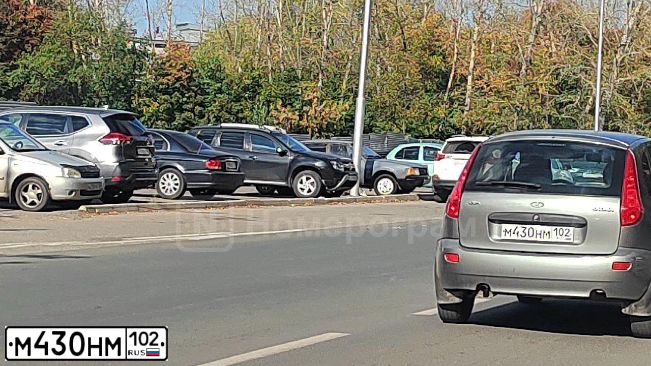 Фото автомобиля LADA 1119 KALINA, 2009 — госномер М430НМ102. Цвет: Темно-серый металлик