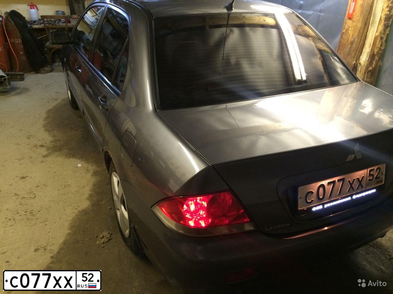 Фото автомобиля MITSUBISHI LANCER, 2005 — госномер А363ТМ252. Цвет: СЕРЫЙ