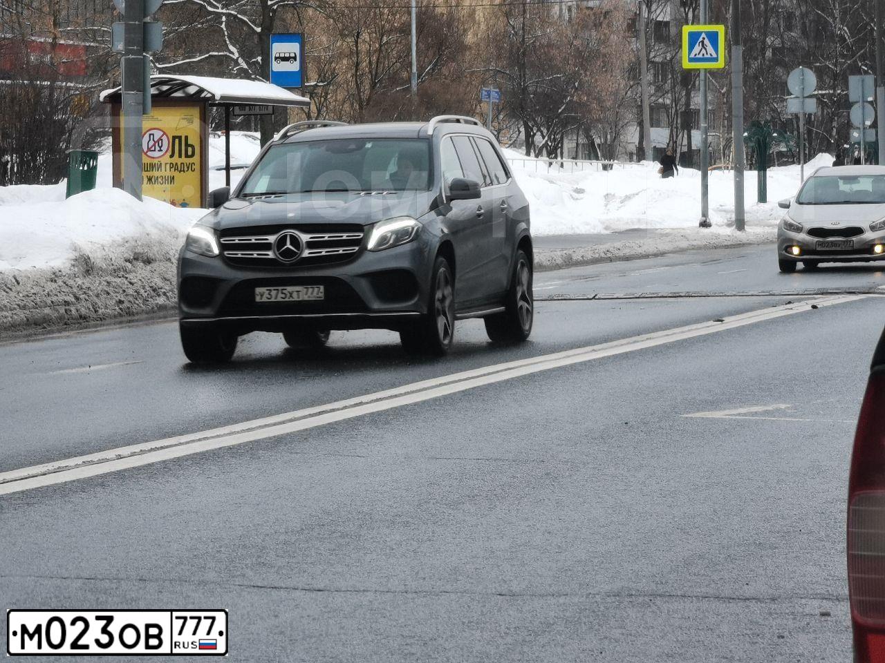 Фото автомобиля JEEP ДЖИП ГРАНД ЧЕРОКИ ОВЕРЛЭНД, 2014 — госномер М023ОВ777. Цвет: ТЕМНО-КРАСНЫЙ