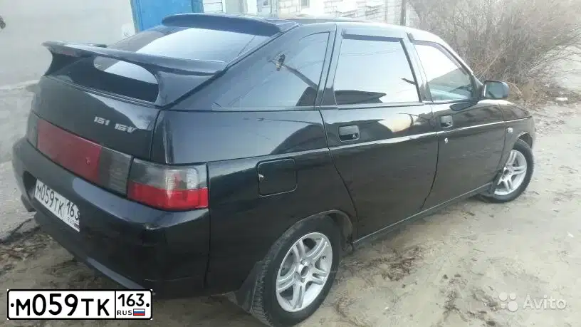 Фото автомобиля LADA 2112 LADA, 2007 — госномер В342РК134. Цвет: Сине-черный