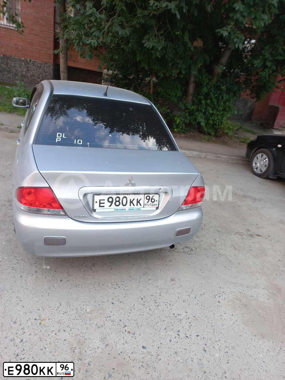 Фото автомобиля MITSUBISHI LANCER, 2006 — госномер Е980КК96. Цвет: СЕРЕБРИСТЫЙ