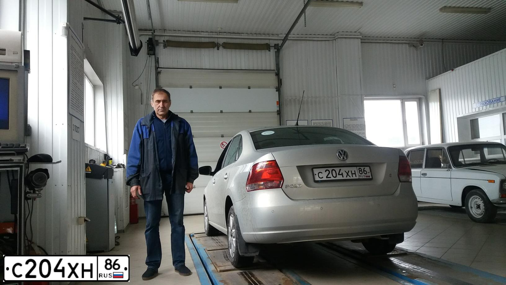 Фото автомобиля VOLKSWAGEN POLO, 2011 — госномер М182ЕЕ702