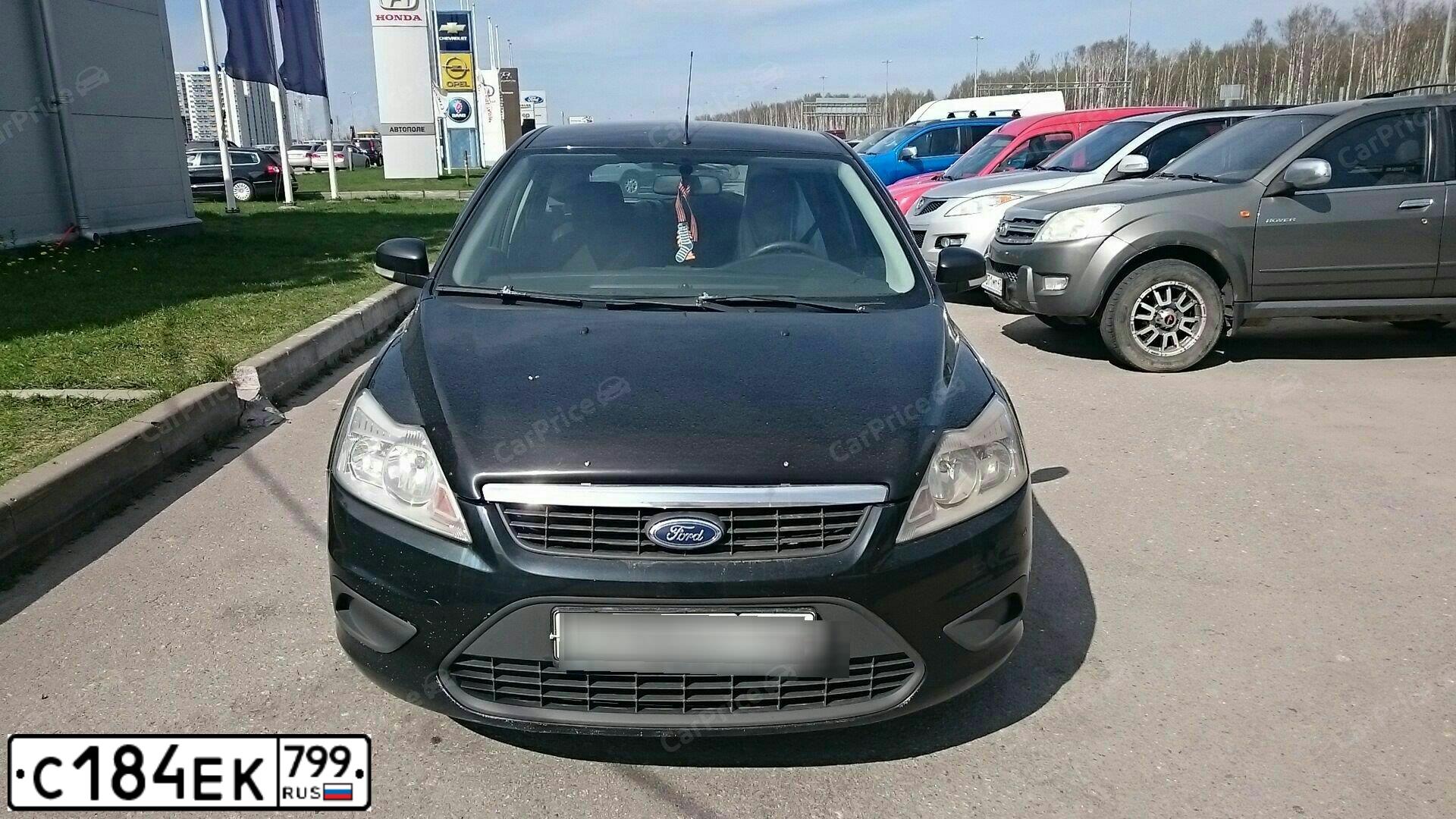 Фото автомобиля FORD FOCUS, 2009 — госномер С184ЕК799. Цвет: ЧЕРНЫЙ