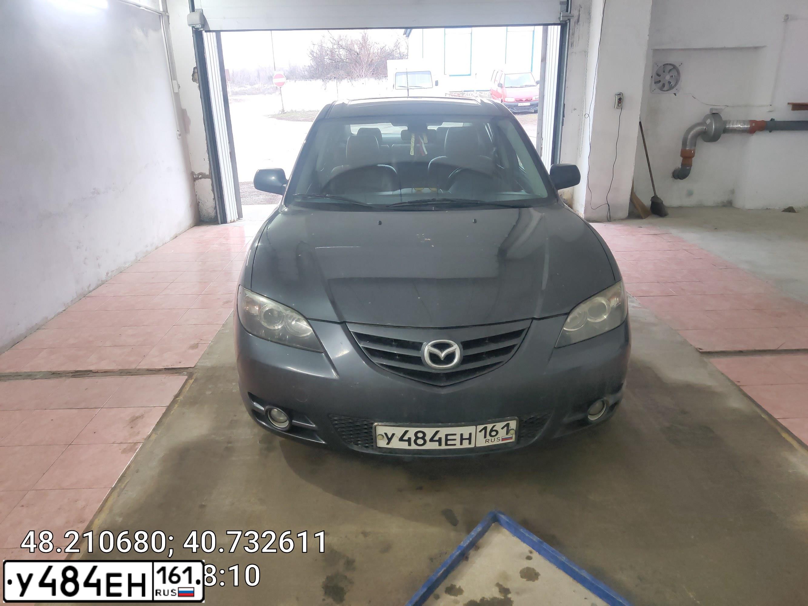 Фото автомобиля MAZDA 3, 2005 — госномер У484ЕН161. Цвет: Т.СЕРЫЙ