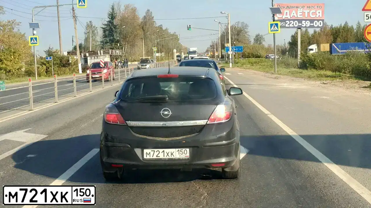 Фото автомобиля OPEL ASTRA, 2008 — госномер Н673НХ67. Цвет: ЧЕРНЫЙ