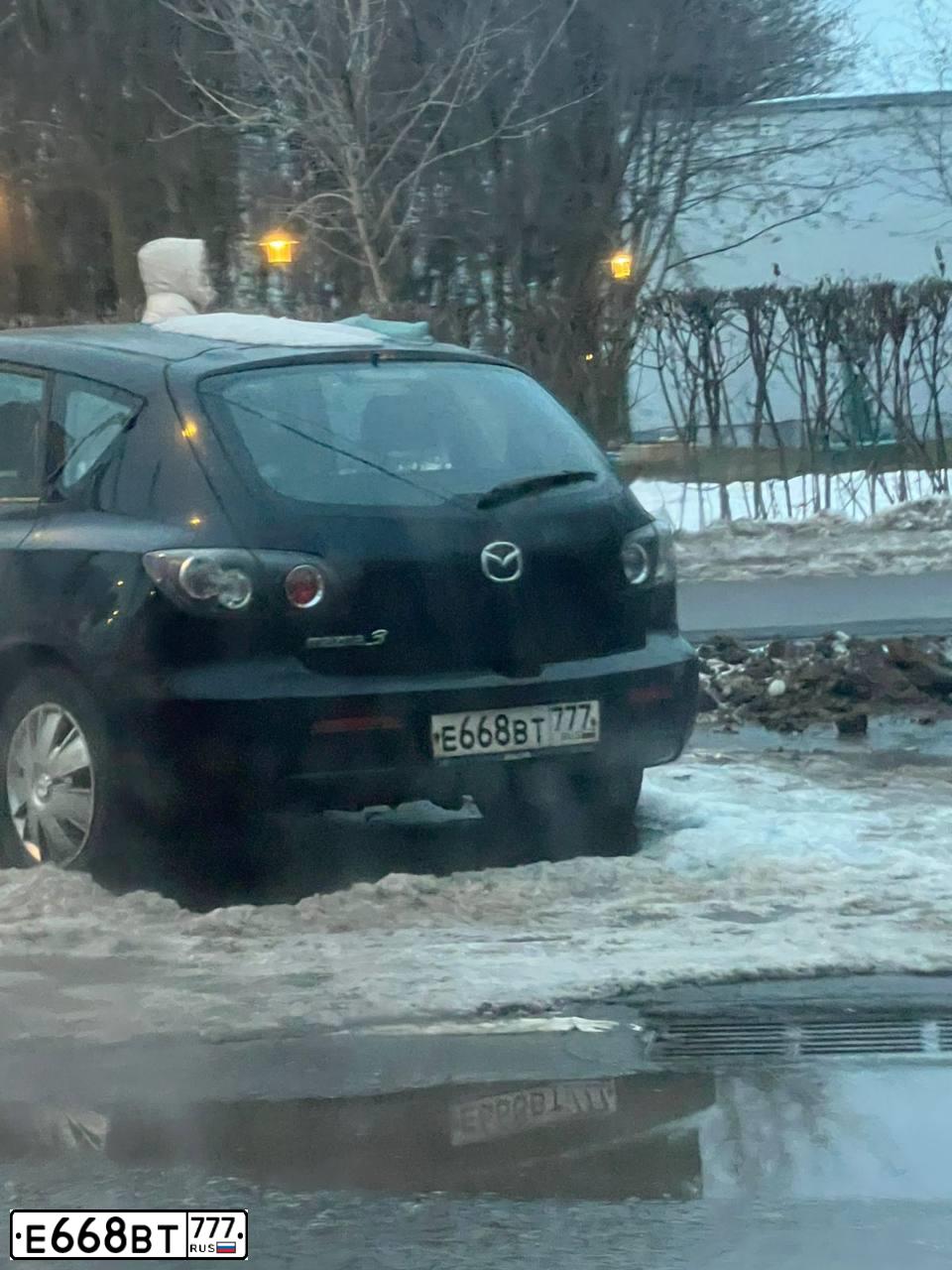 Фото автомобиля MAZDA 3, 2008 — госномер Е668ВТ777. Цвет: ЧЕРНЫЙ