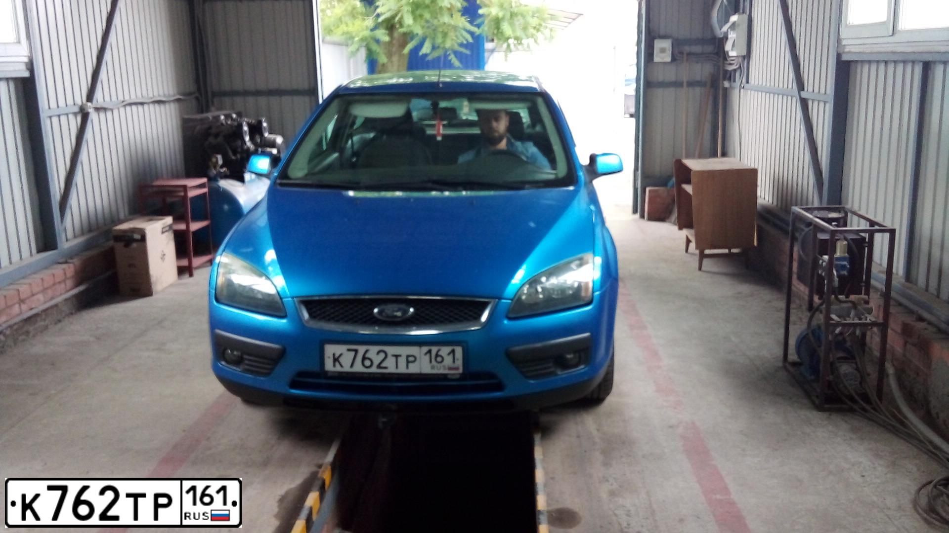 Фото автомобиля FORD FOCUS, 2005 — госномер К762ТР161. Цвет: голубой