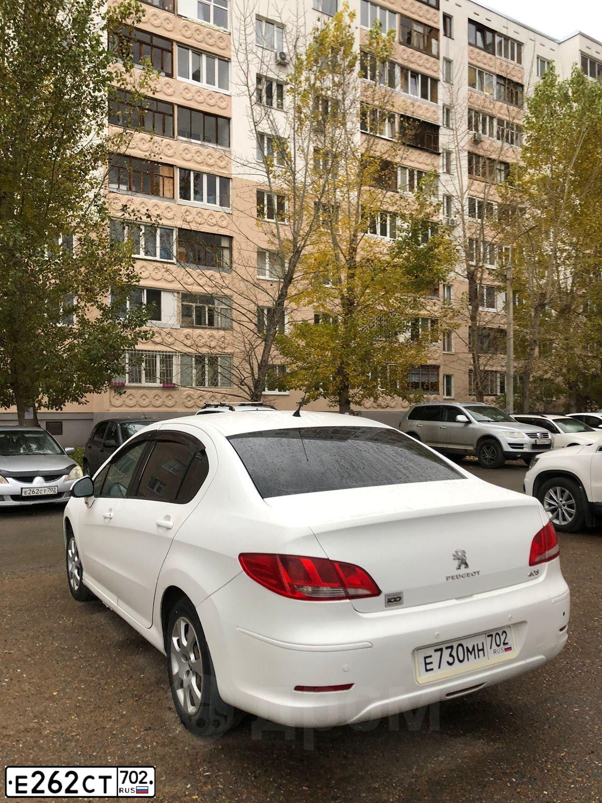 Фото автомобиля MITSUBISHI LANCER, 2003 — госномер Е262СТ702. Цвет: СЕРЕБРИСТЫЙ