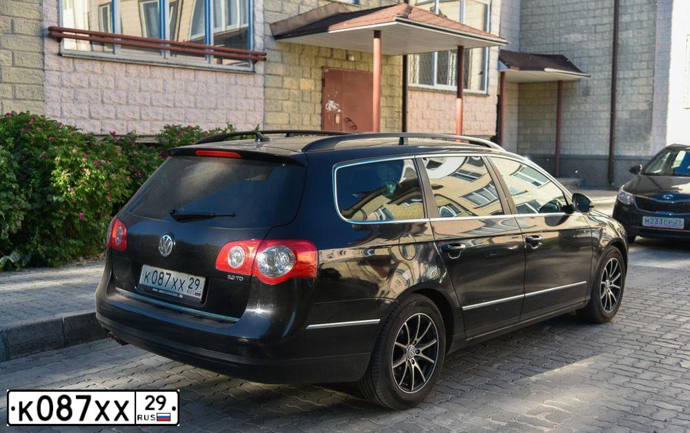 Фото автомобиля VOLKSWAGEN PASSAT, 2009 — госномер О833ТР29. Цвет: ЧЕРНЫЙ