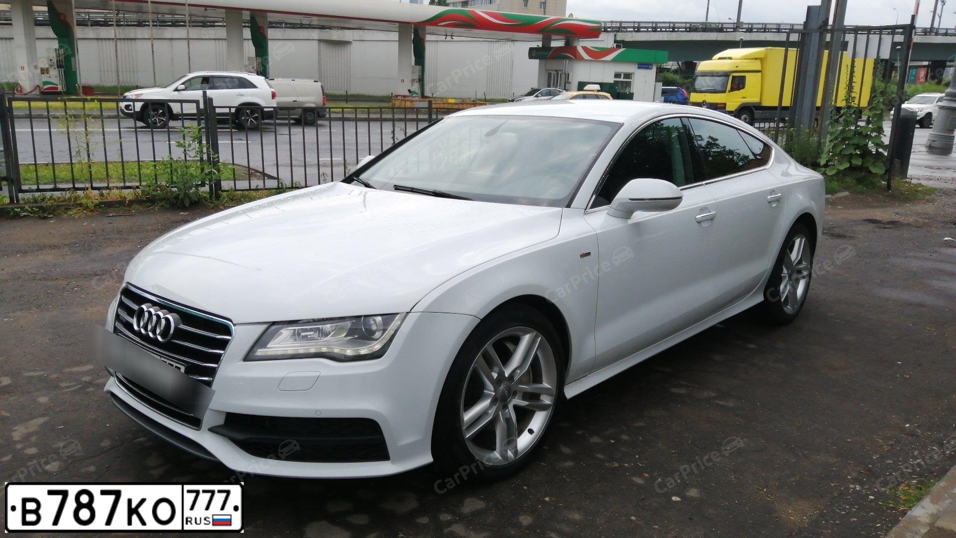 Фото автомобиля AUDI A7, 2014 — госномер Н060ОО30. Цвет: Белый