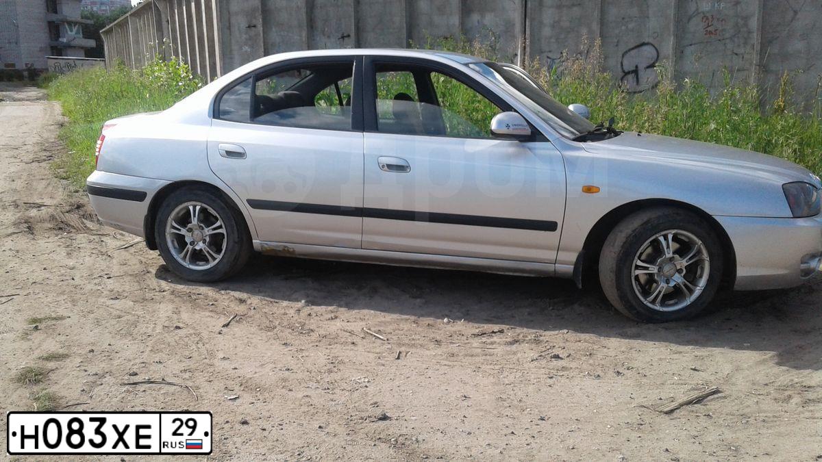 Фото автомобиля HYUNDAI ELANTRA, 2005 — госномер Н083ХЕ29. Цвет: Серебристый