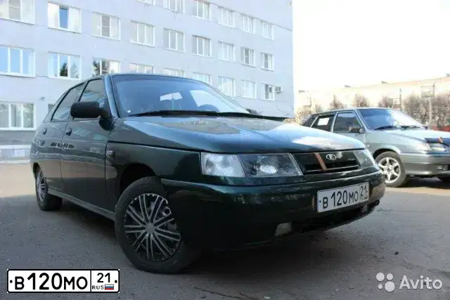 Фото автомобиля LADA 2112, 2003 — госномер Н702ОУ21. Цвет: Темно-зеленый