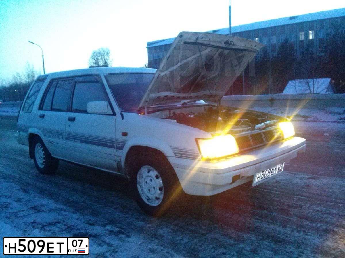 Фото автомобиля LADA 2349 WIS, 2013 — госномер К058РУ126. Цвет: СЕРЕБРИСТО-ТЕМНО-СЕРЫЙ