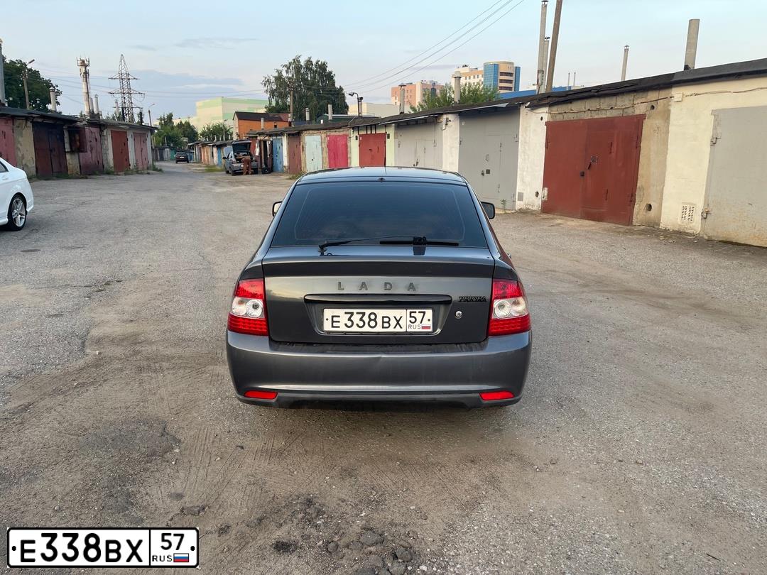 Фото автомобиля LADA 2172 PRIORA, 2014 — госномер В153СН57. Цвет: СЕРЕБРИСТО-ТЕМНО-СЕРЫЙ