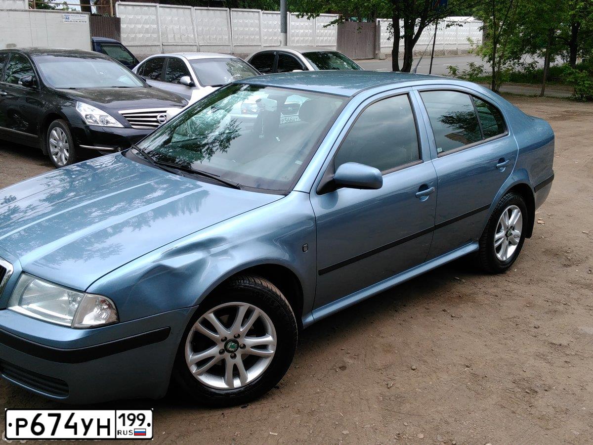 Фото автомобиля SKODA OCTAVIA, 2009 — госномер Е576АТ761. Цвет: СЕРО-ГОЛУБОЙ