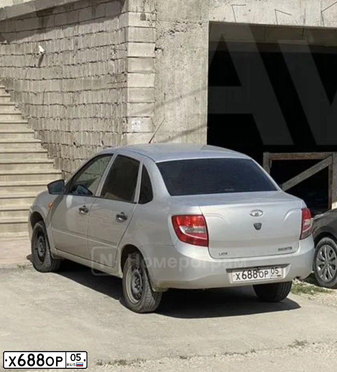 Фото автомобиля LADA 2190 GRANTA, 2013 — госномер Х688ОР05. Цвет: СЕРЕБРИСТЫЙ