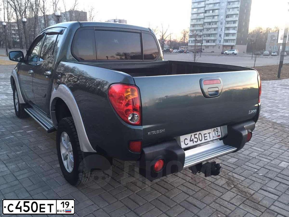 Фото автомобиля MITSUBISHI L 200, 2008 — госномер С450ЕТ19. Цвет: ЗЕЛЕНЫЙ