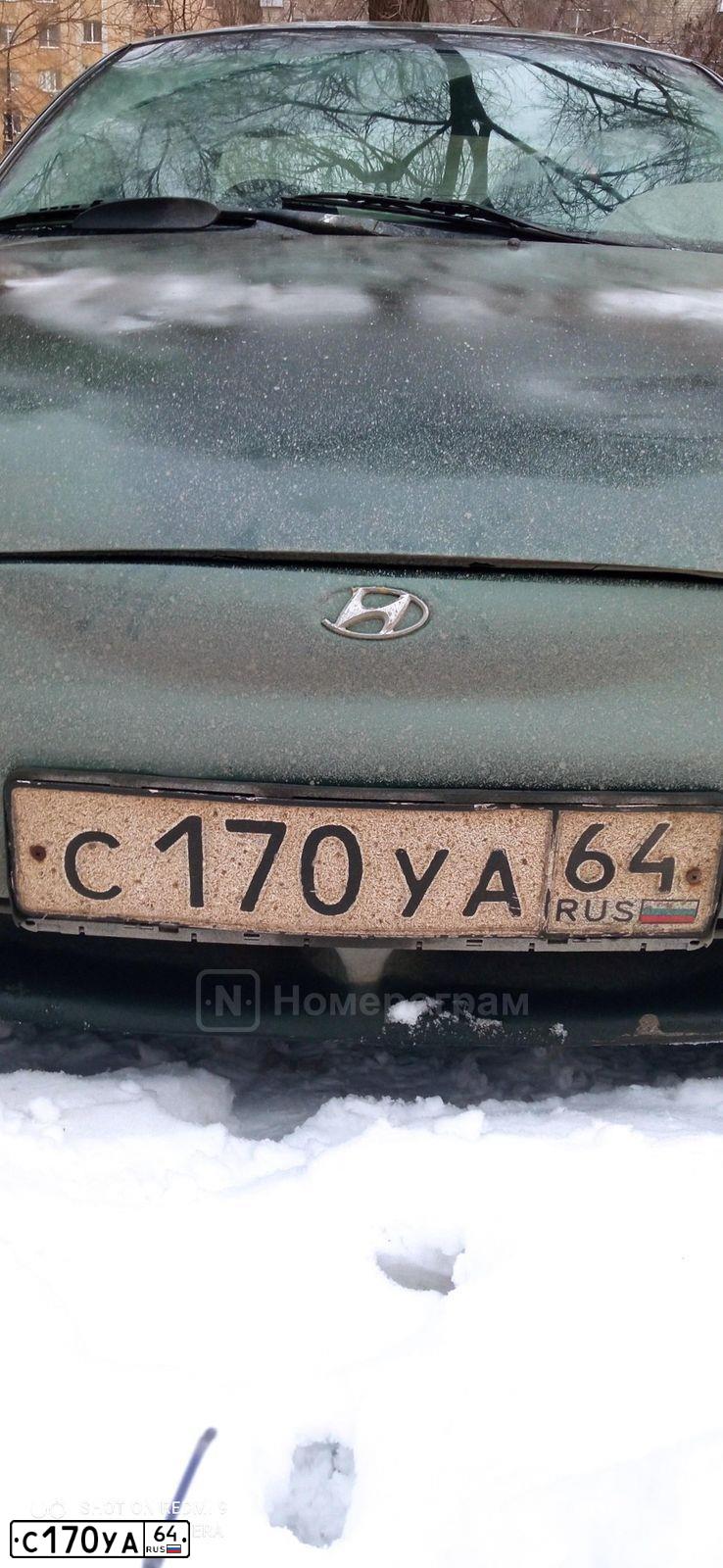 Фото автомобиля HYUNDAI LANTRA, 1997 — госномер С170УА64. Цвет: ЗЕЛЕНЫЙ