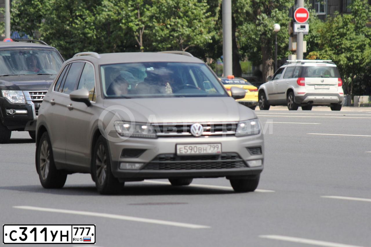 Фото автомобиля MITSUBISHI LANCER, 2008 — госномер Р704КВ32. Цвет: ЧЕРНЫЙ