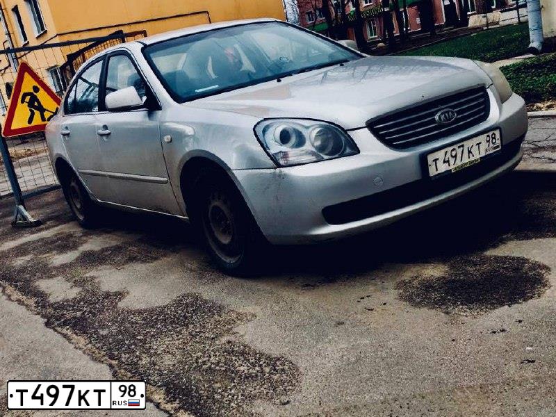 Фото автомобиля KIA OPTIMA, 2007 — госномер М719АМ53. Цвет: Серебристый