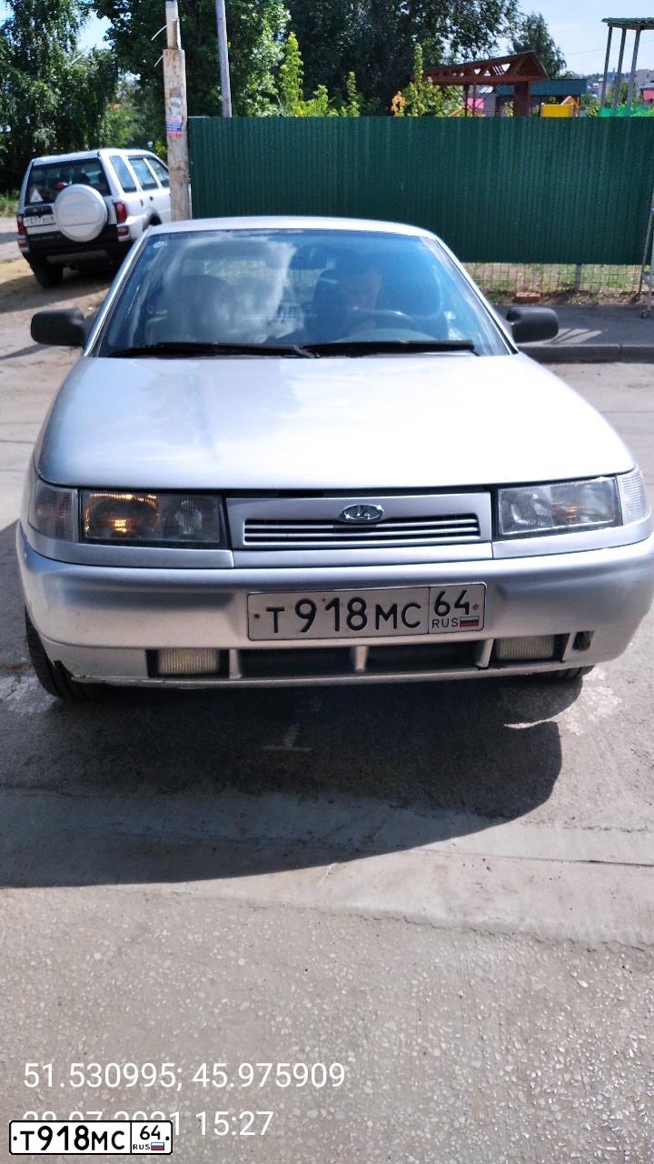 Фото автомобиля LADA 2112, 2007 — госномер Т918МС64. Цвет: СВЕТЛО-СЕРЕБРИСТЫЙ МЕТАЛЛ
