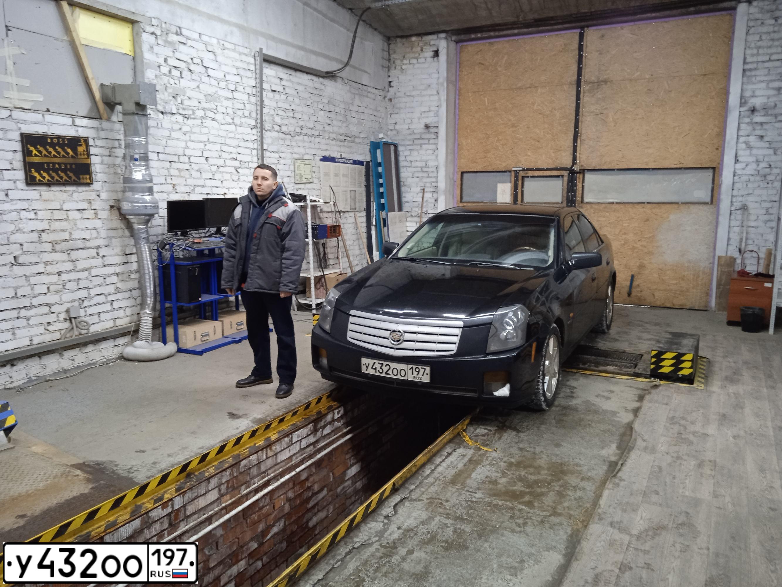 Фото автомобиля CADILLAC C CTS, 2003 — госномер Р119КВ977. Цвет: ЧЕРНЫЙ