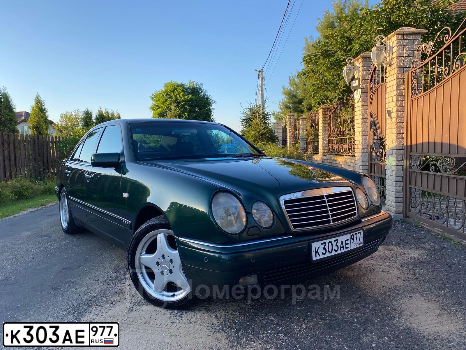Фото автомобиля MERCEDES E-KLASSE, 1997 — госномер К303АЕ977. Цвет: ЗЕЛЕНЫЙ