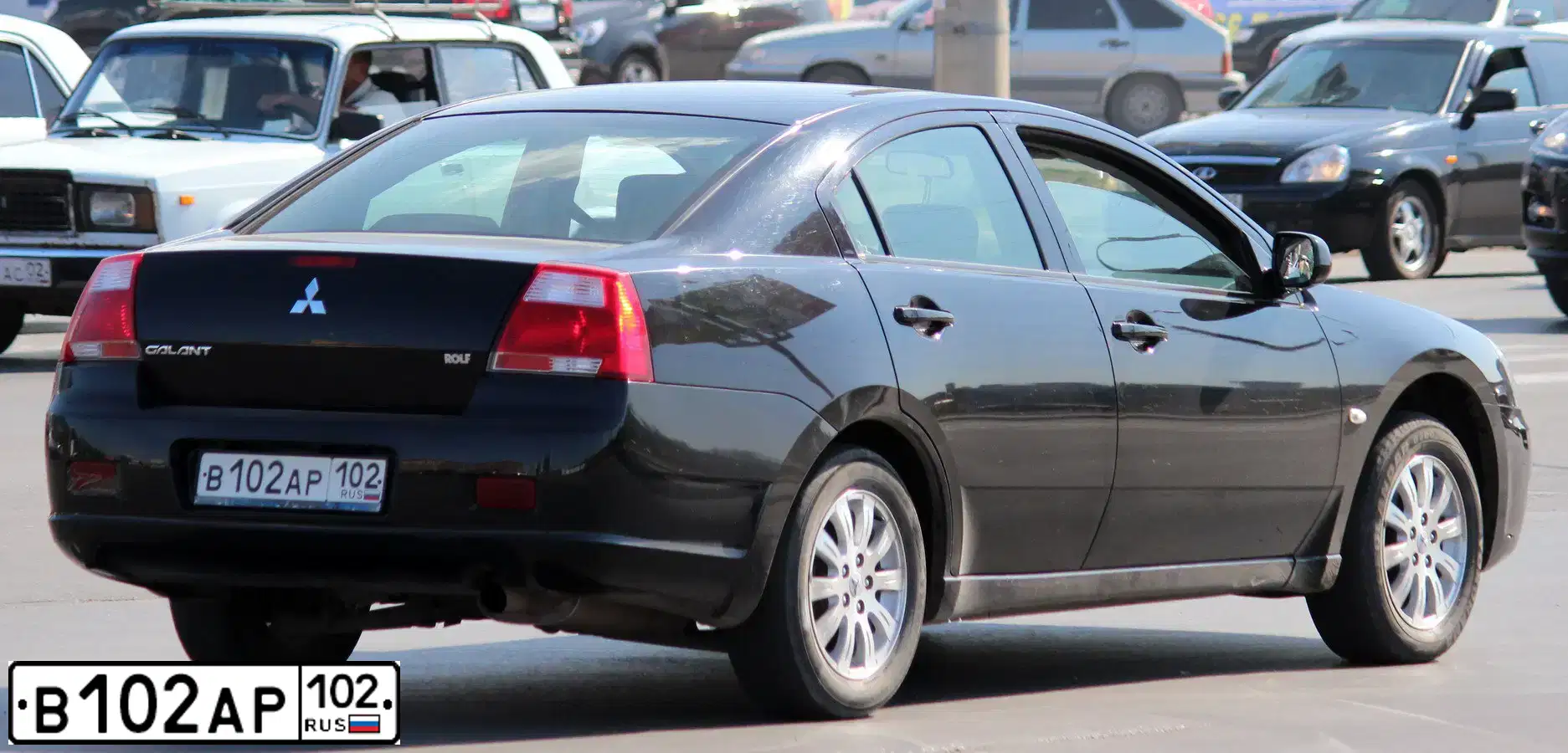 Фото автомобиля MITSUBISHI GALANT, 2007 — госномер В102АР102. Цвет: ЧЕРНЫЙ