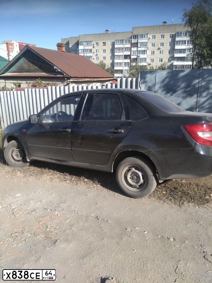 Фото автомобиля LADA 2190 GRANTA, 2012 — госномер К754ОР164. Цвет: ЧЕРНЫЙ