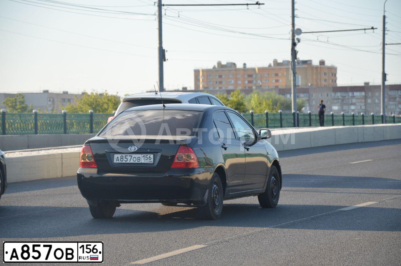 Фото автомобиля TOYOTA COROLLA, 2005 — госномер Н098ОМ702. Цвет: ЧЕРНЫЙ