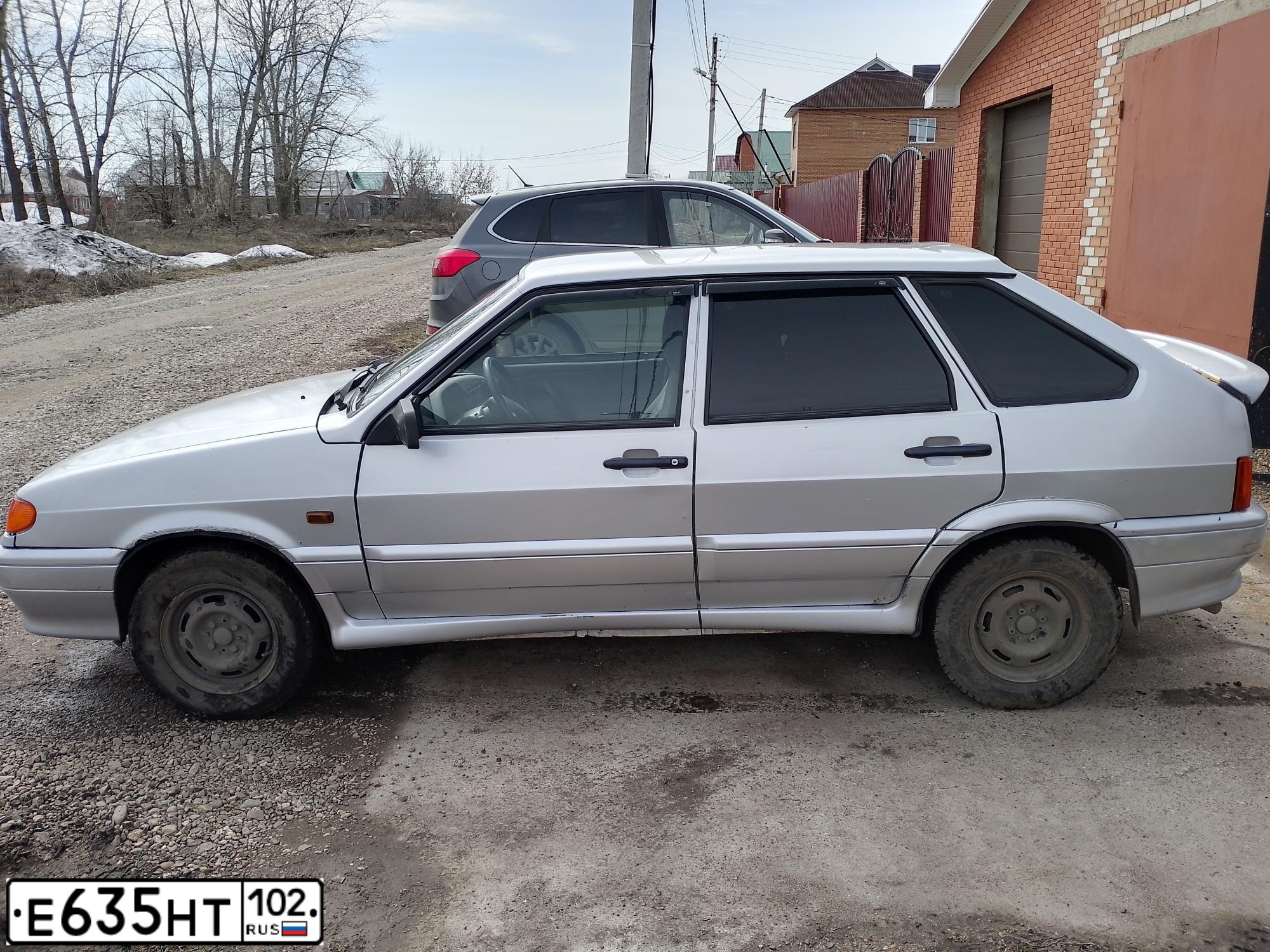 Фото автомобиля LADA 2114, 2008 — госномер Н129АА702. Цвет: Светло-Серебристый металлик
