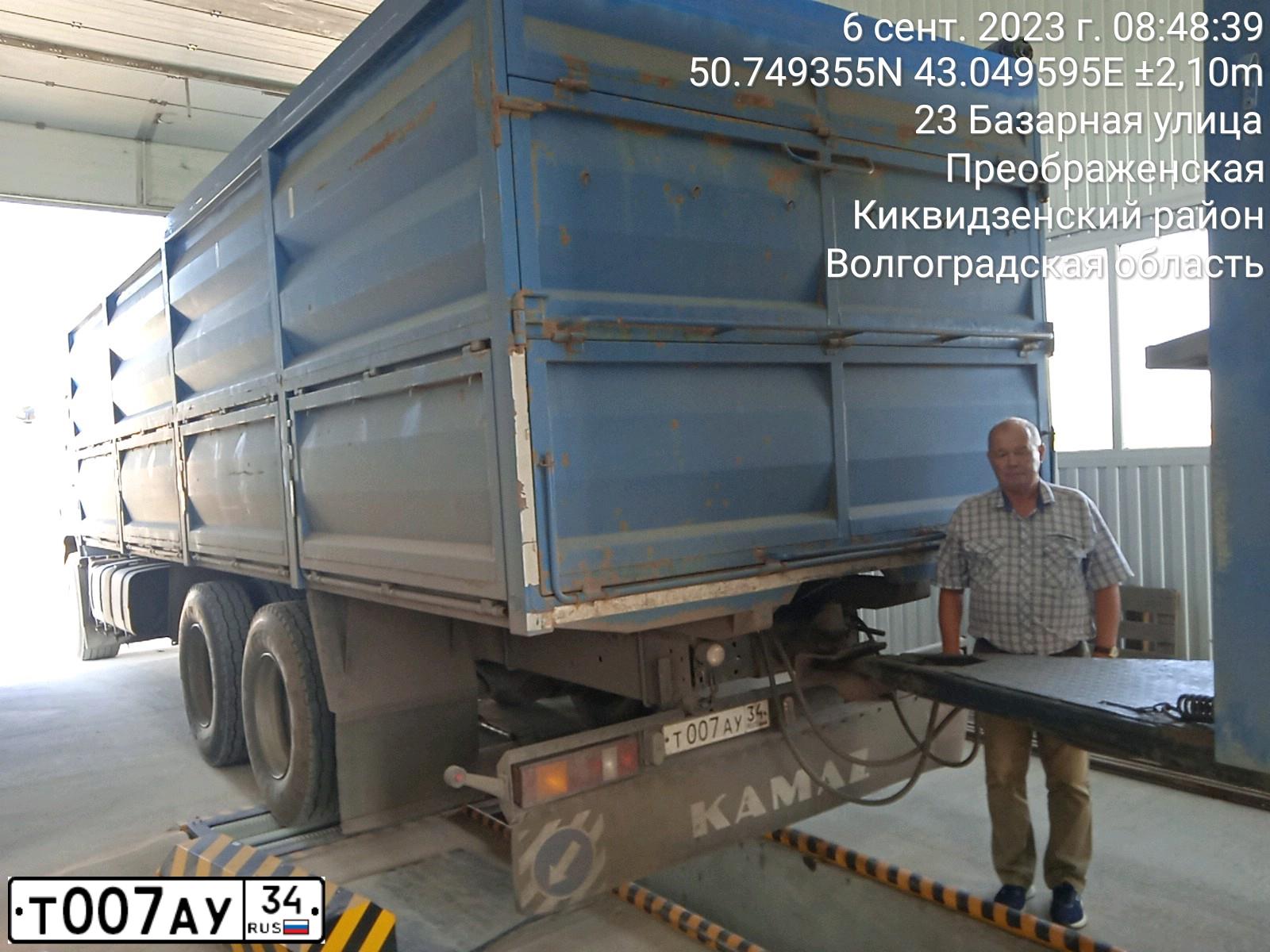 Фото автомобиля KAMAZ 65117 /6X4/, 2014 — госномер Т007АУ34. Цвет: СИНИЙ