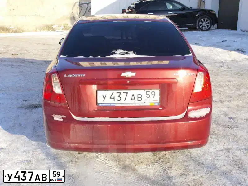 Фото автомобиля CHEVROLET LACETTI, 2006 — госномер М631УЕ159. Цвет: Красный