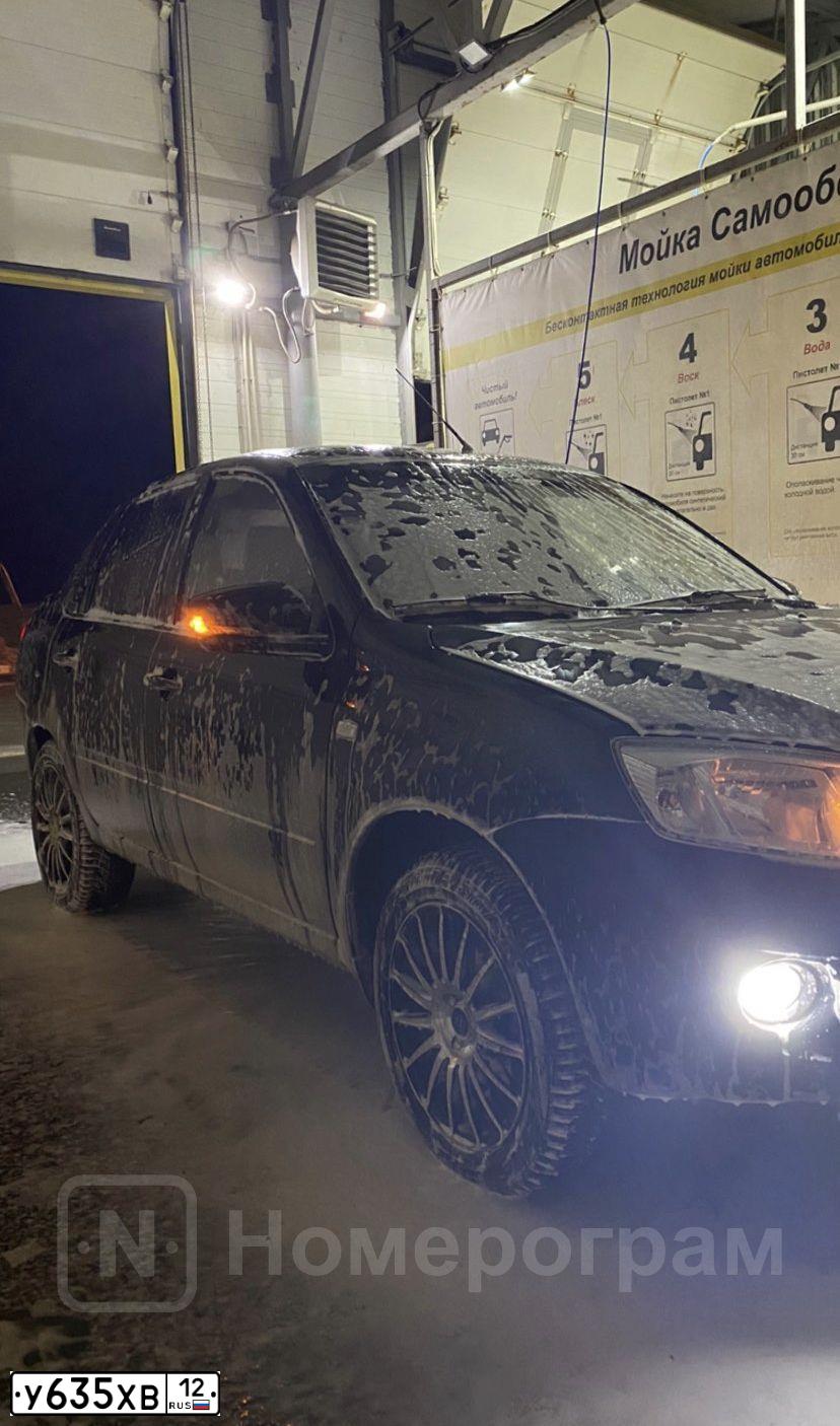 Фото автомобиля LADA 2190 GRANTA, 2013 — госномер Н773ТХ12. Цвет: Сине-Черный