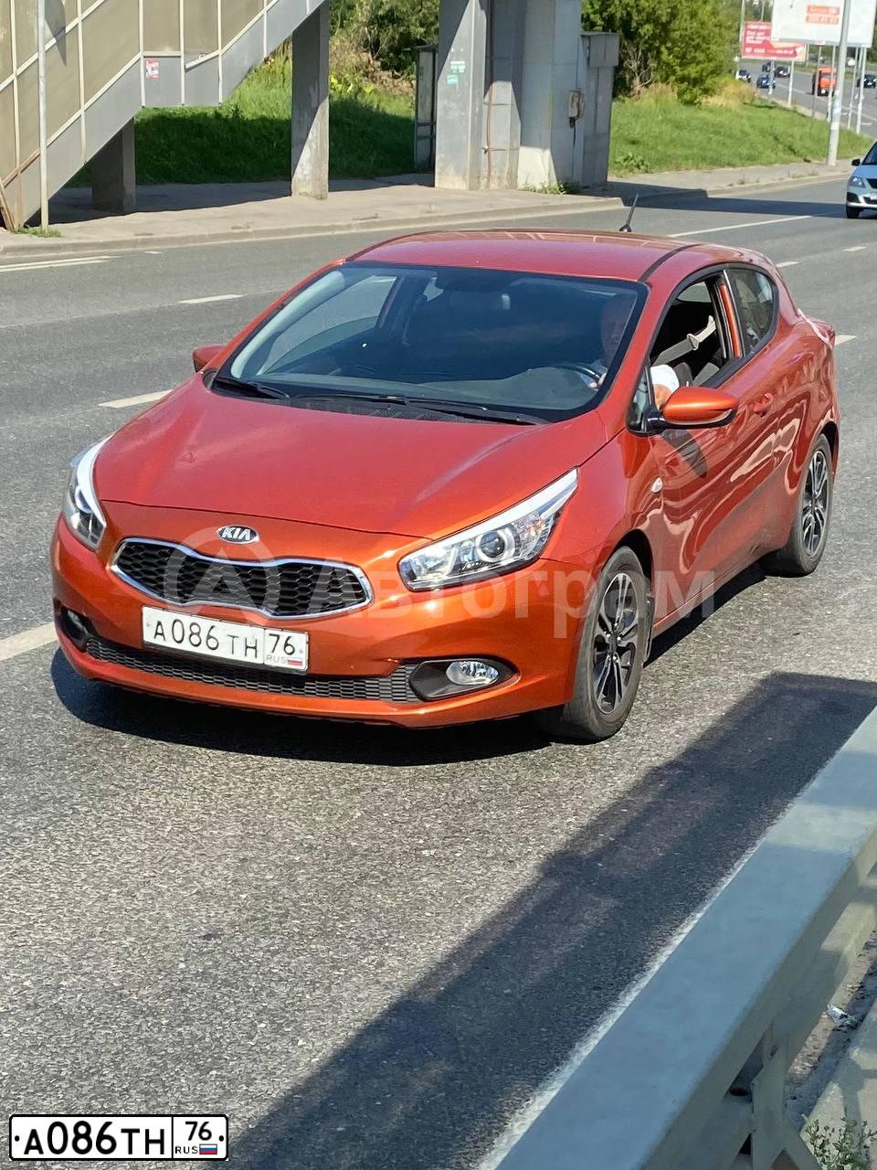 Фото автомобиля KIA CEE'D, 2013 — госномер М708АУ716. Цвет: Оранжевый