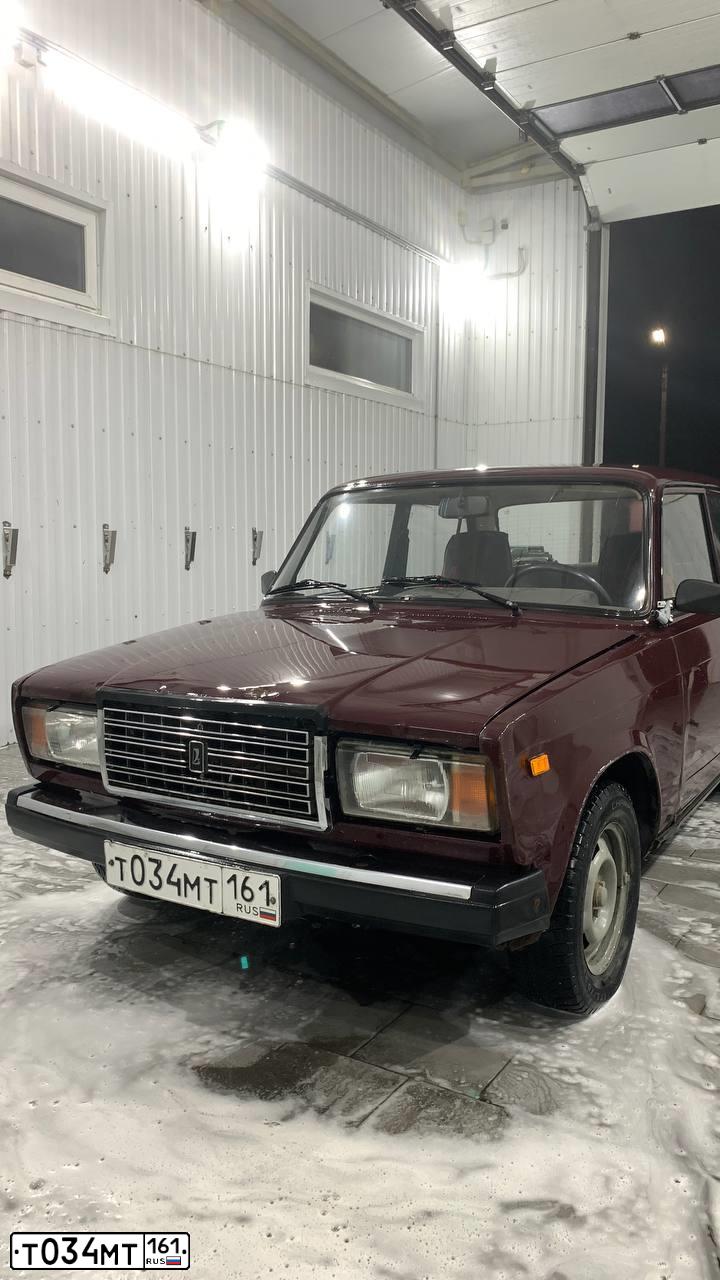 Фото автомобиля LADA 2107, 2005 — госномер Т034МТ161. Цвет: ТЕМНО-ВИШНЕВЫЙ