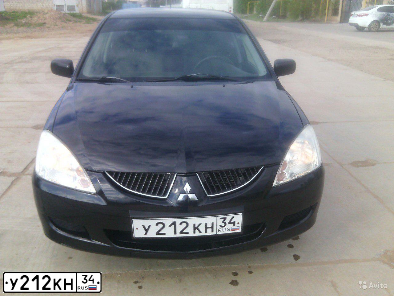 Фото автомобиля MITSUBISHI LANCER, 2005 — госномер С413ОО30. Цвет: ЧЕРНЫЙ