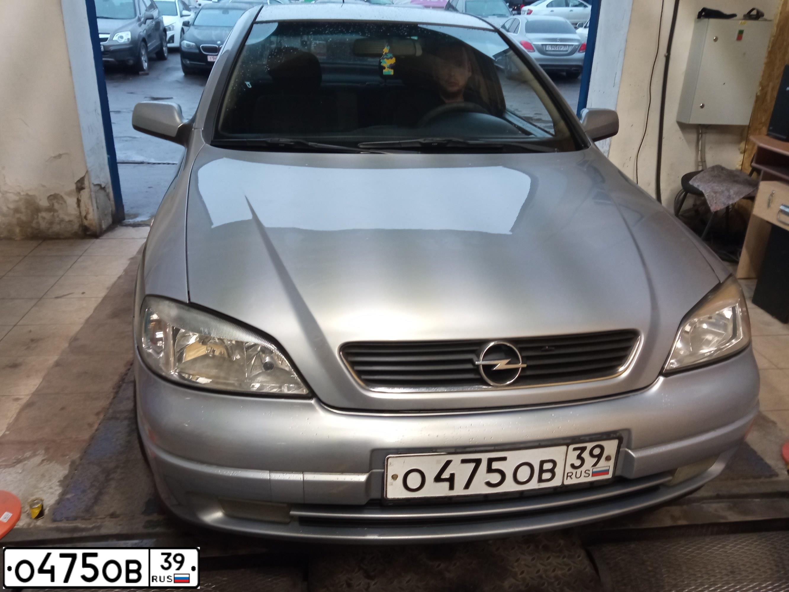 Фото автомобиля OPEL ASTRA, 2000 — госномер Р249МК177. Цвет: СЕРЫЙ