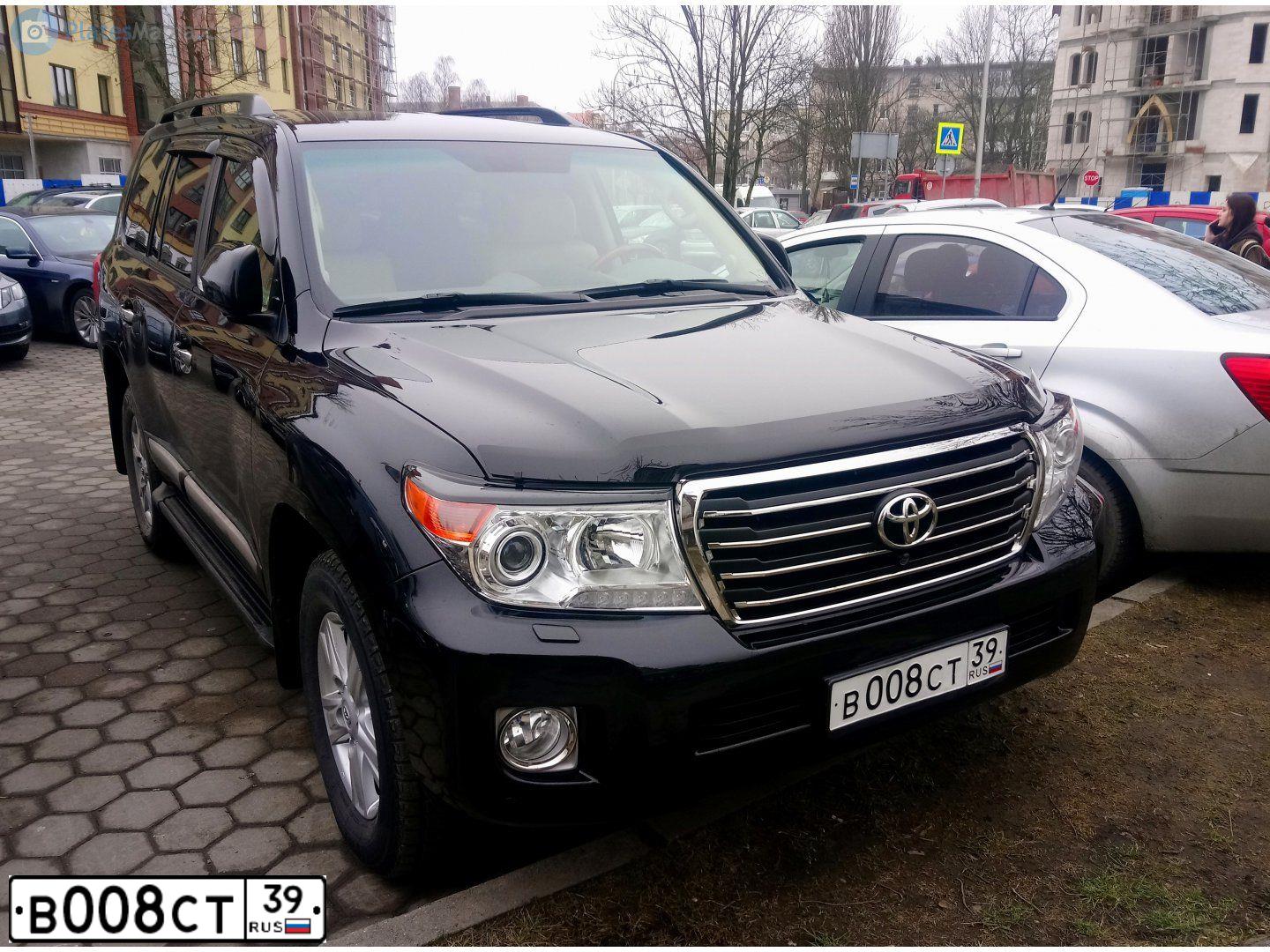 Фото автомобиля BMW X5, 2010 — госномер Р757ТТ39. Цвет: ЧЕРНЫЙ