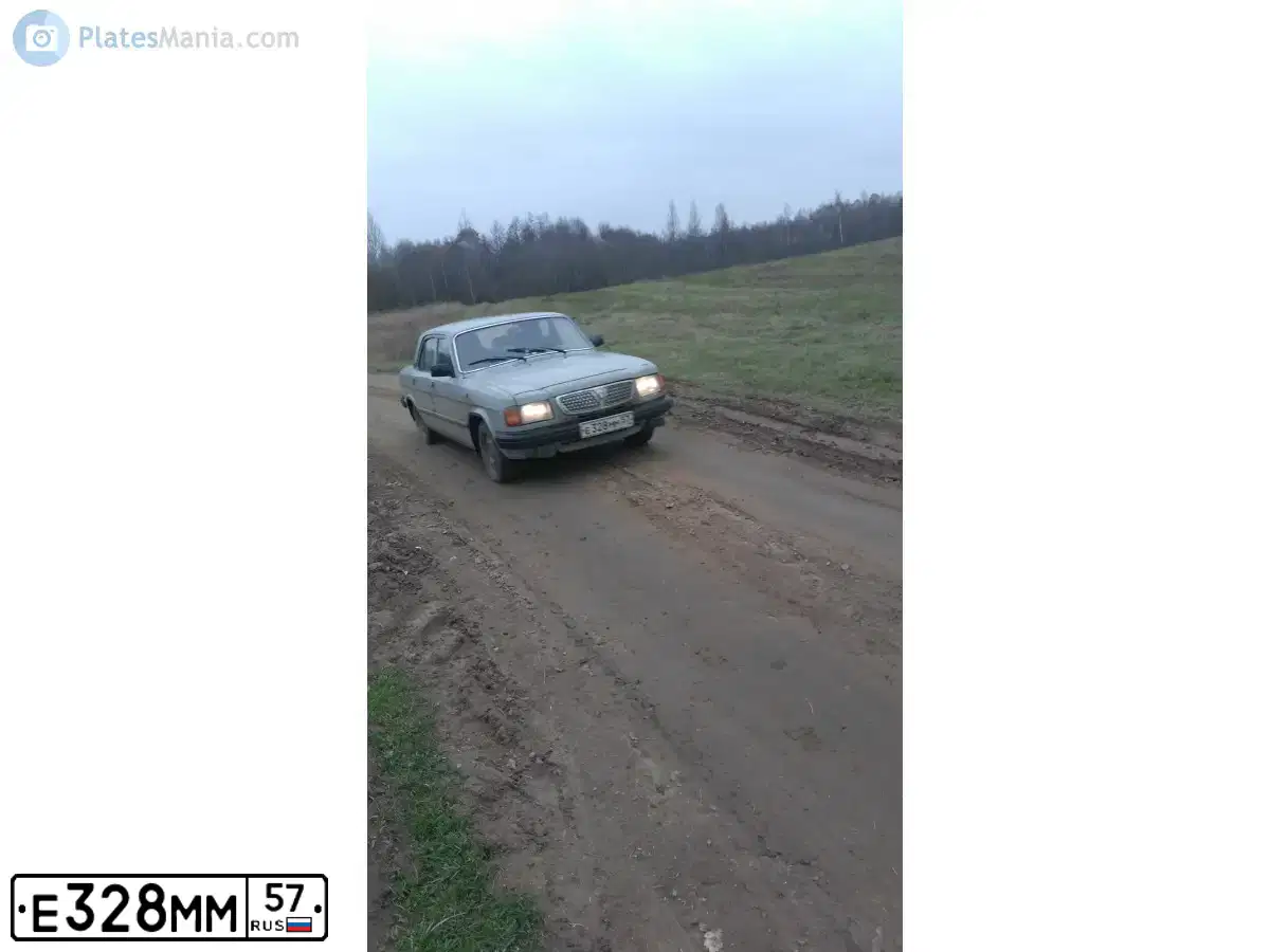 Фото автомобиля ГАЗ 3110, 1998 — госномер А027УУ57. Цвет: СЕРЫЙ