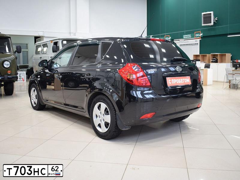 Фото автомобиля KIA CEE'D, 2008 — госномер Т703НС62. Цвет: ЧЕРНЫЙ ПЕРЛАМУТР