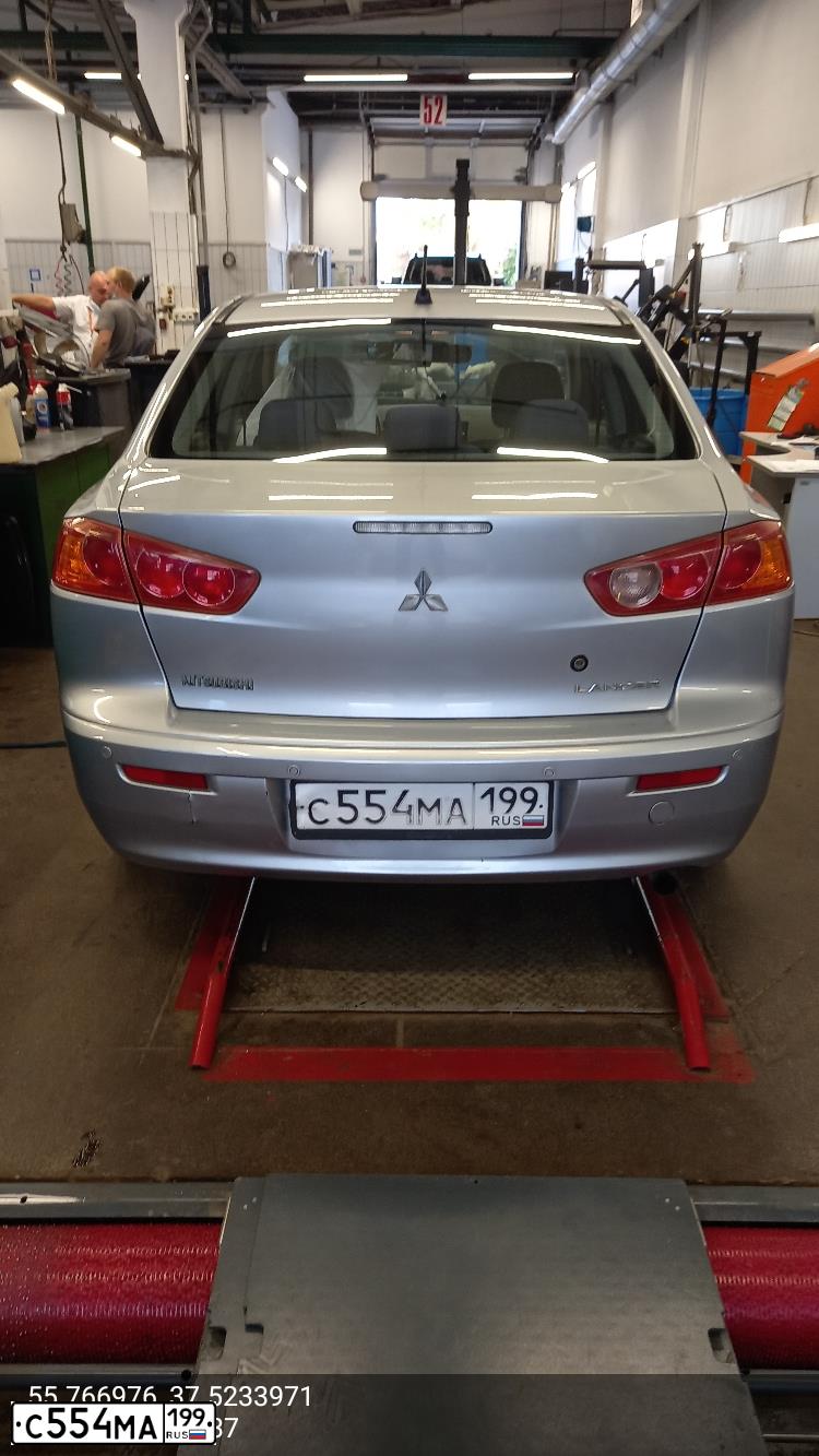 Фото автомобиля MITSUBISHI LANCER, 2008 — госномер С554МА199. Цвет: СТАЛЬНОЙ