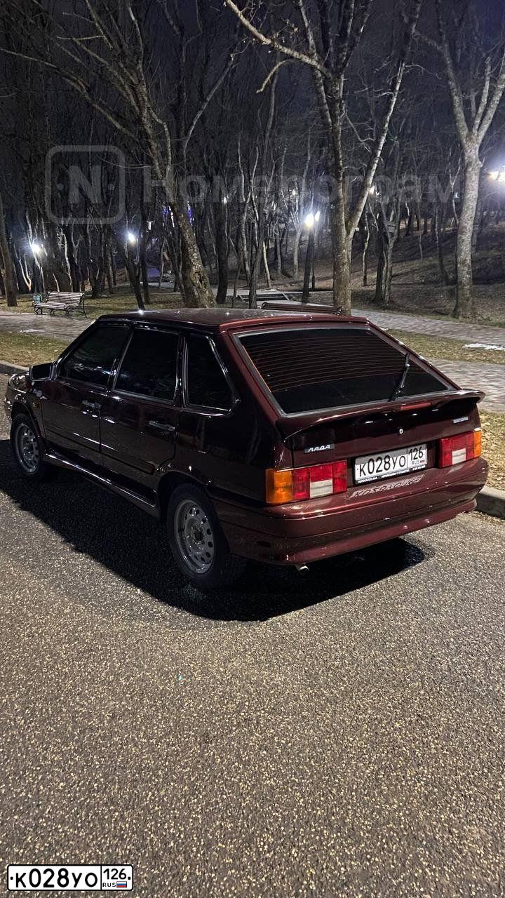 Фото автомобиля LADA 2114 SAMARA, 2011 — госномер К028УО126. Цвет: Красный