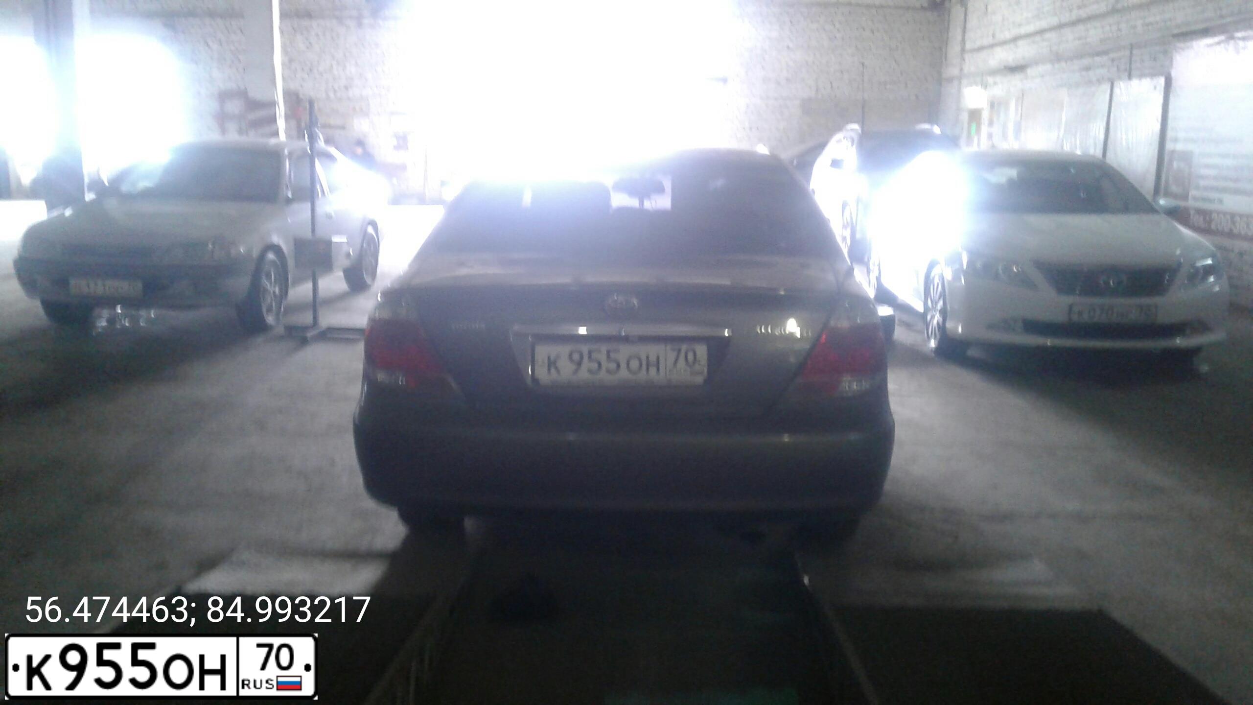 Фото автомобиля TOYOTA CAMRY, 2005 — госномер К955ОН70. Цвет: СЕРЫЙ
