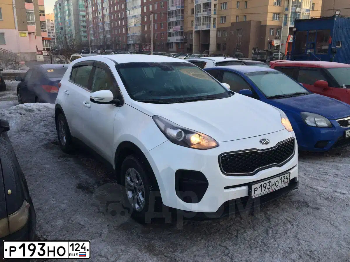 Фото автомобиля KIA SPORTAGE, 2016 — госномер Р193НО124. Цвет: БЕЛЫЙ