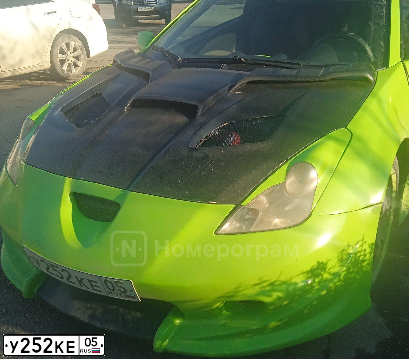 Фото автомобиля TOYOTA CELICA, 2003 — госномер У252КЕ05. Цвет: ЗЕЛЕНЫЙ (ЯРКО САЛАТОВЫЙ)