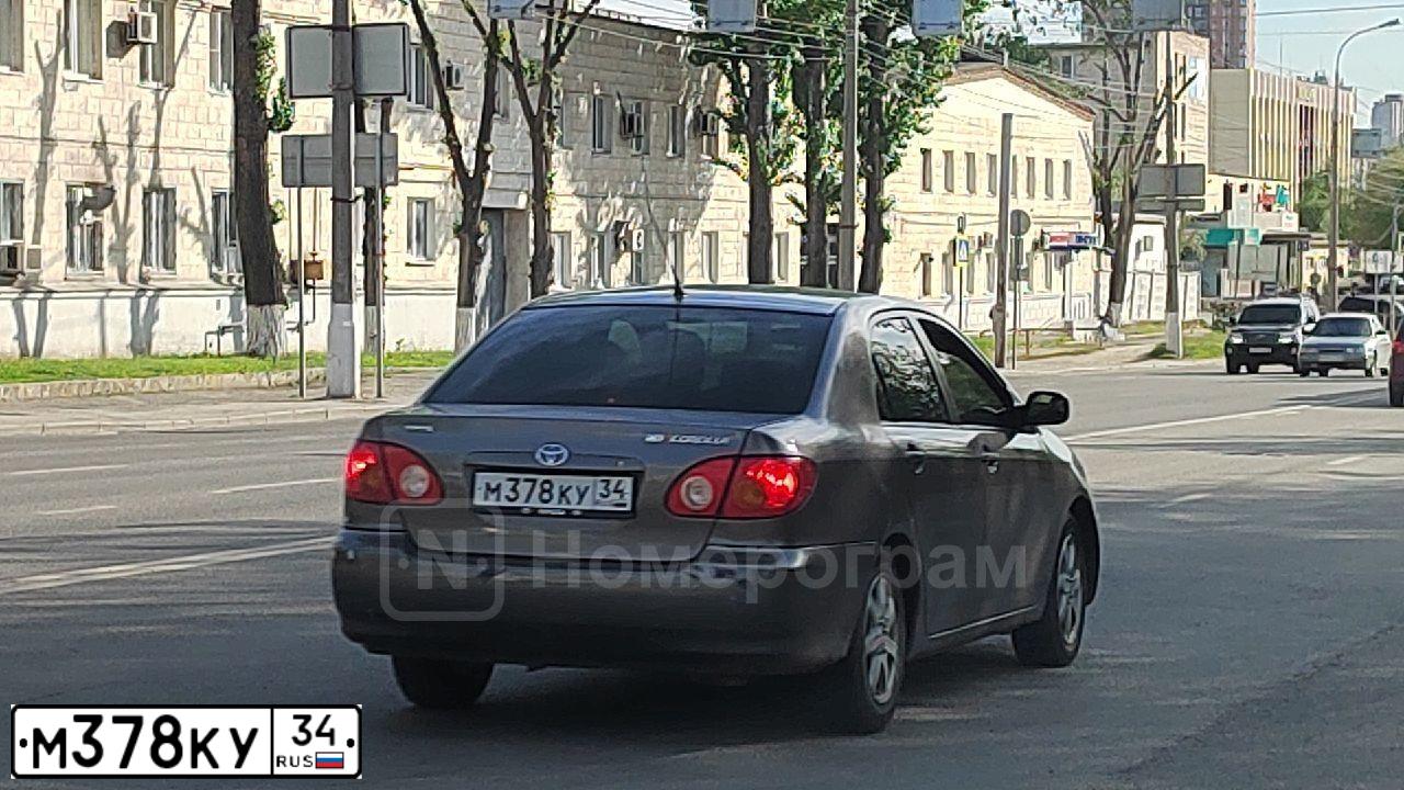Фото автомобиля TOYOTA COROLLA, 2002 — госномер М378КУ34. Цвет: СЕРЫЙ