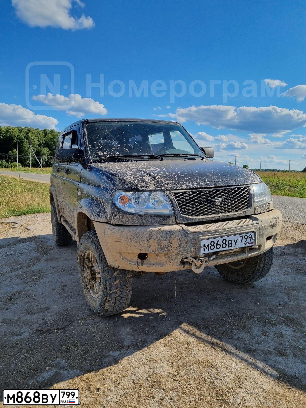 Фото автомобиля UAZ PATRIOT, 2009 — госномер Е850КВ977. Цвет: ЧЕРНЫЙ
