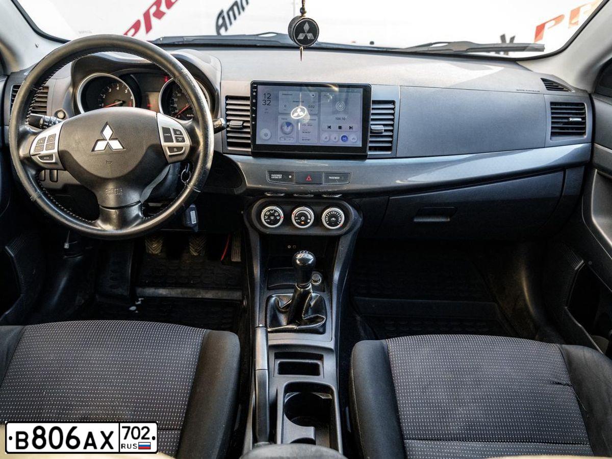 Фото автомобиля MITSUBISHI LANCER, 2008 — госномер С219ОС196. Цвет: ЧЕРНЫЙ